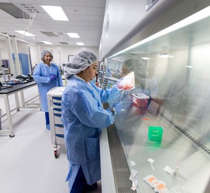 Picture of researchers working in the Advanced Cellular Therapy Lab at the University of Chicago Medicine