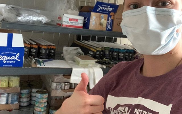 University of CHicago Pritzker School of Medicine studen Rachel Rolinski stocks a food pantry for cancer patients.