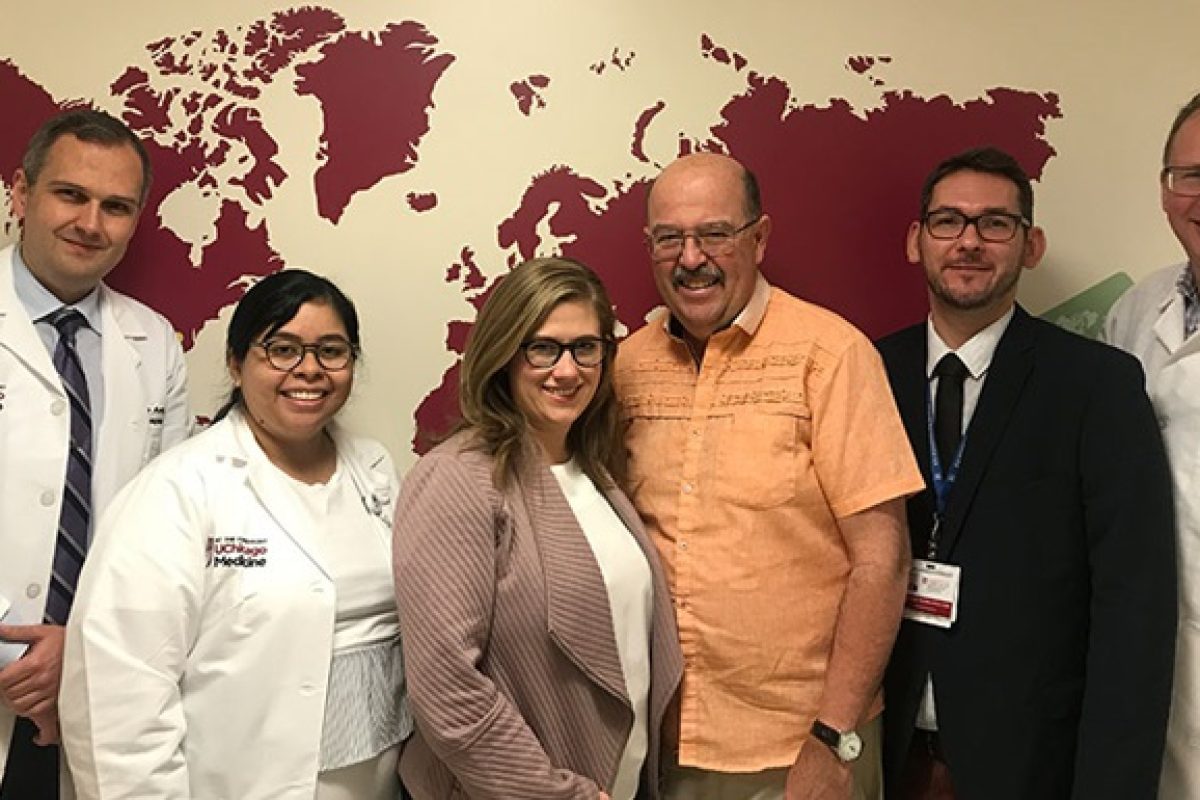 From left, Piotr Bachul, MD, Islet Cell Transplant Research Fellow; Laurencia Perea, BSN, RN; Lindsay Basto, MSN, RN; islet transplant recipient Mark Morrison; visiting physician Michal Komorniczak, MD, and Piotr Witkowski, MD, PhD, Director, Pancreatic and Islet Transplant Program.