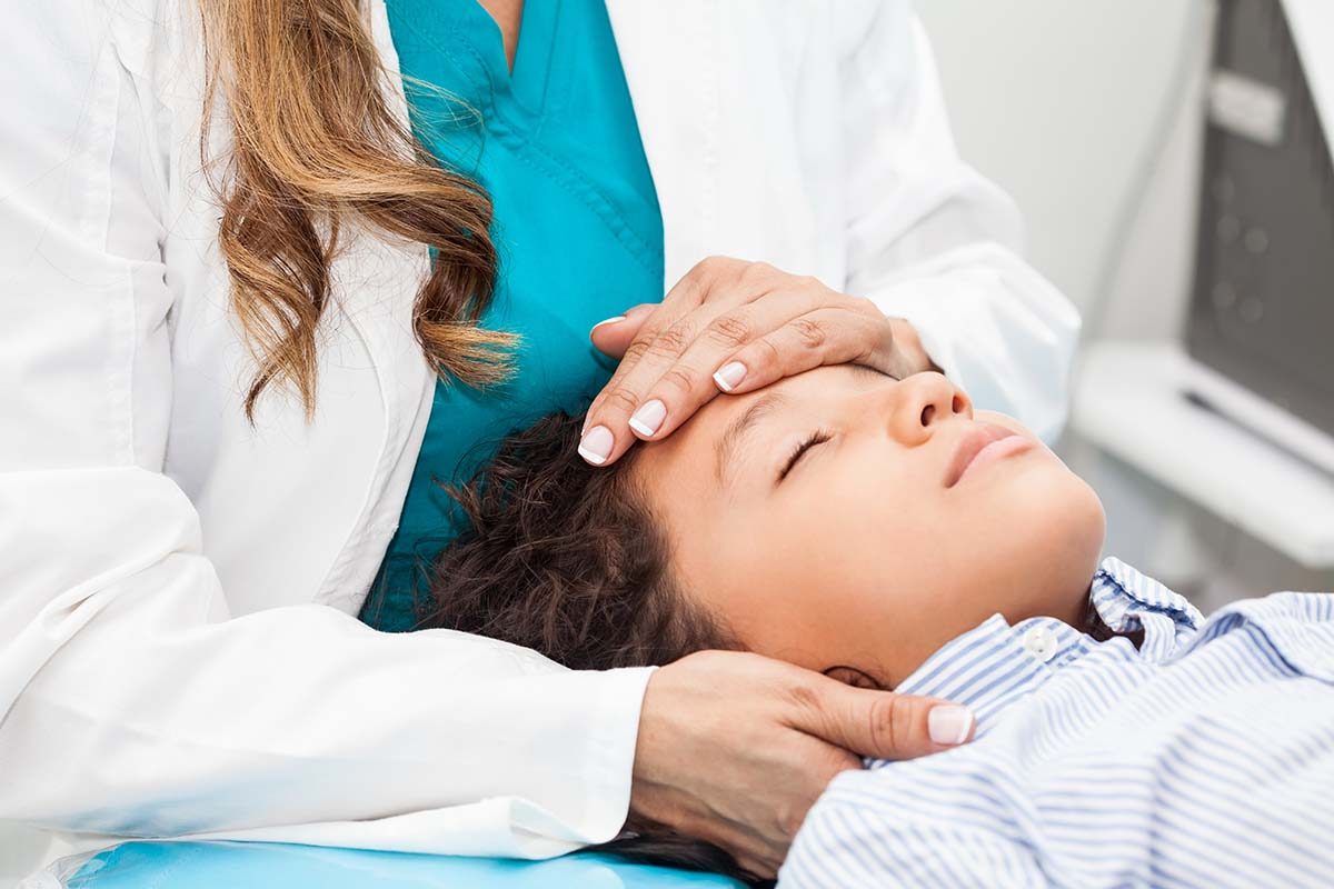 Picture of a child lying down in a doctor's office