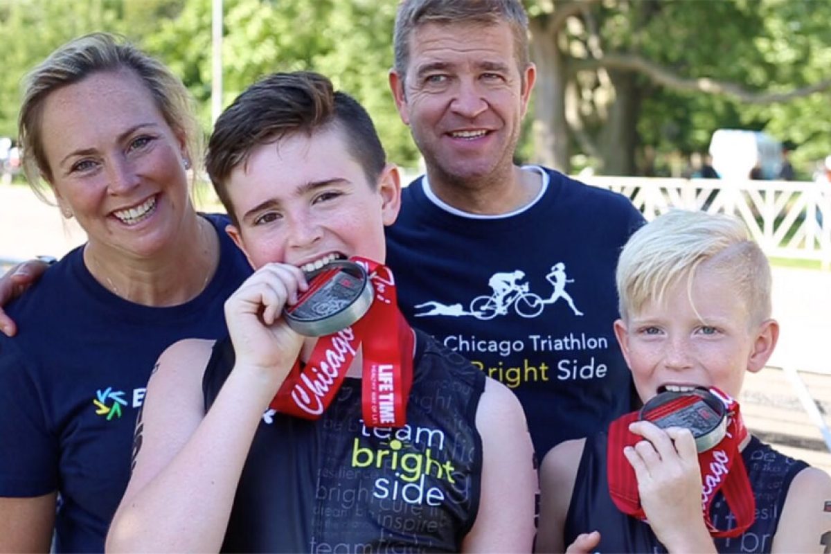 Ryan, Sean, Tracey, and Ray Scheppach represent Team Bright Side during the Chicago trathlon to raise money for groundbreaking research.