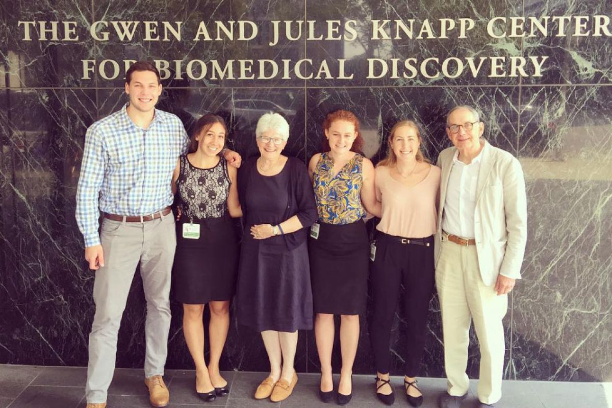 Ted's parents Mary Henry (third from left) and Rick Mullin (far right) with the Ted Mullin Scholars at the University of Chicago.