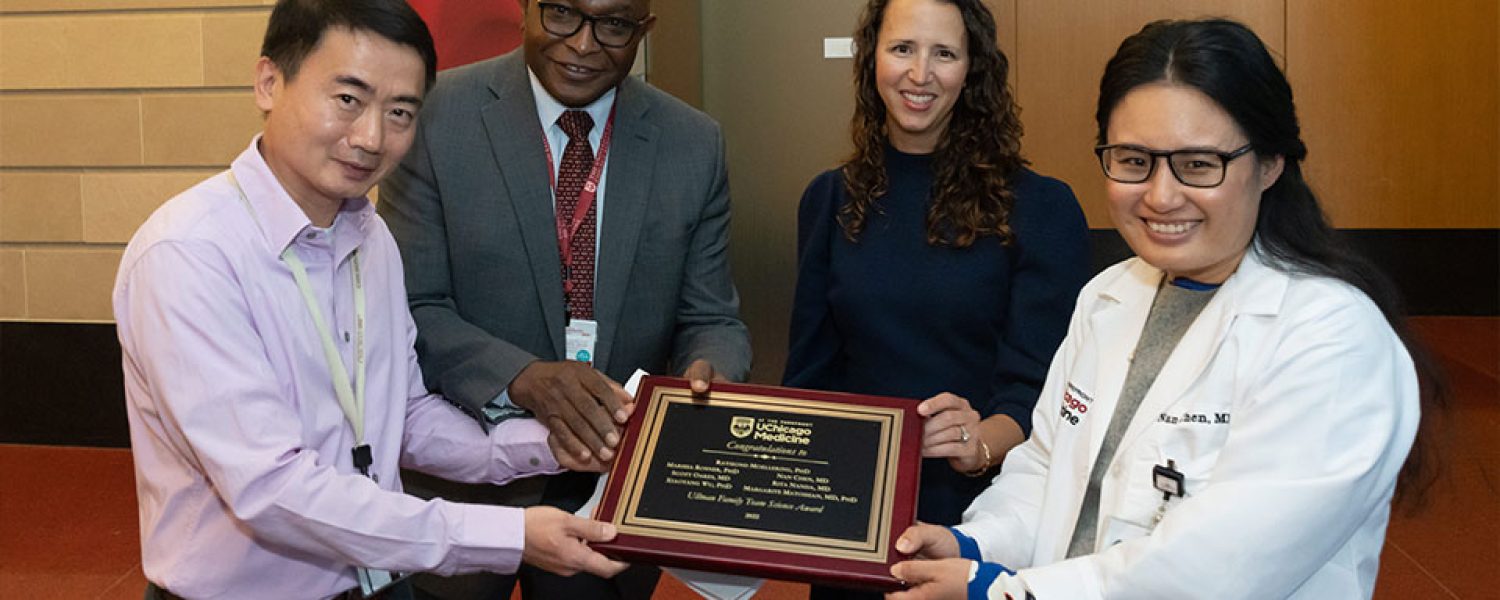 From left to right: Xiaoyang Wu, PhD; Kunle Odunsi, MD, PhD; Suzanne Ullman; and Nan Chen, MD at the presentation of the Ullman Family Team Science Award.
