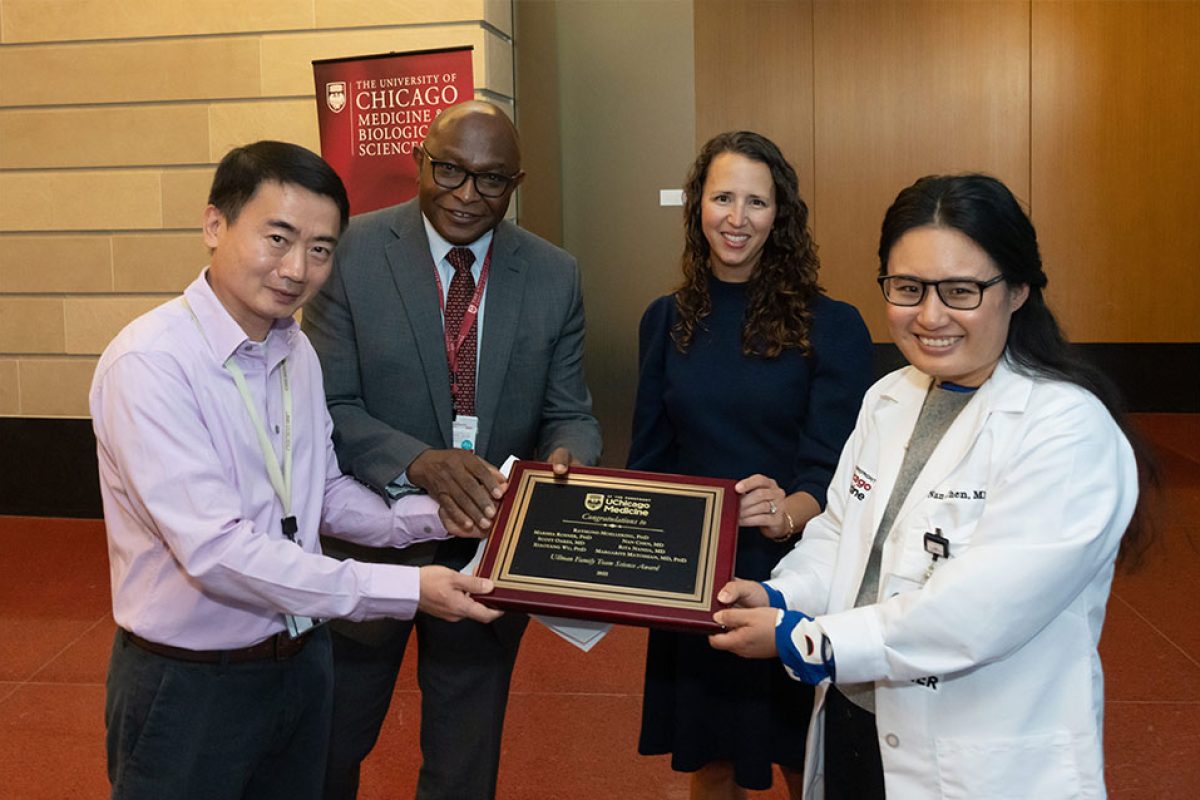 From left to right: Xiaoyang Wu, PhD; Kunle Odunsi, MD, PhD; Suzanne Ullman; and Nan Chen, MD at the presentation of the Ullman Family Team Science Award.